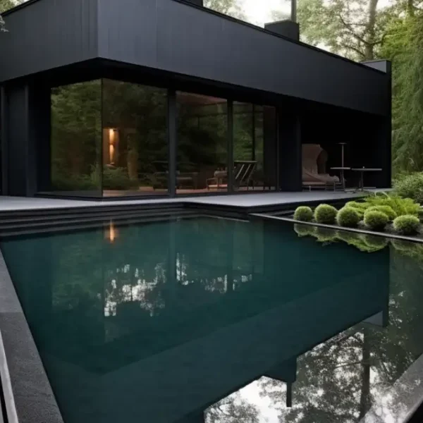black swimming pool in green nature