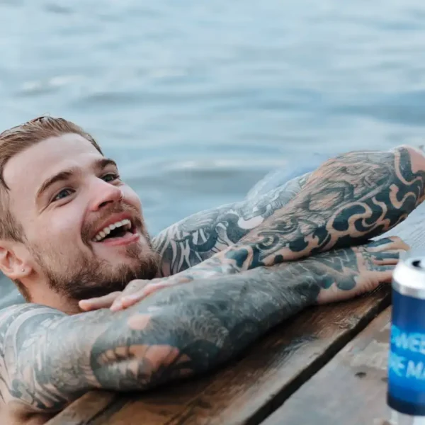 swimmR - We Are Swimming 88 swimming tattoo ideas tattoed men in water