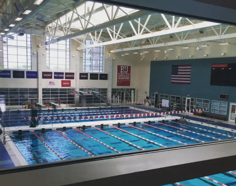 Competitive Swimming: Achieving Peak Performance & Records! 9 competitive swimming pool feature image